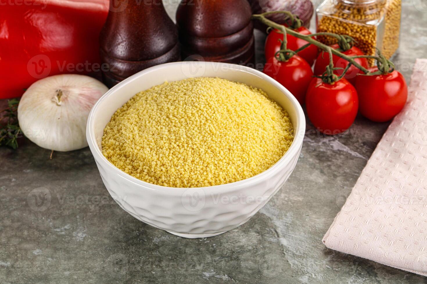 Raw dry wheat couscous grain photo