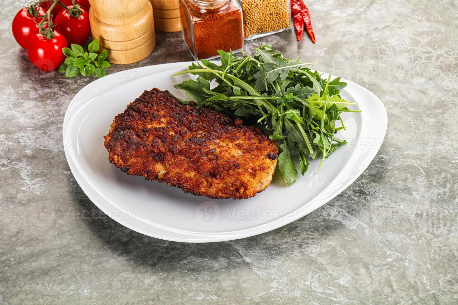 Tasty roasted breaded meat schnitzel photo