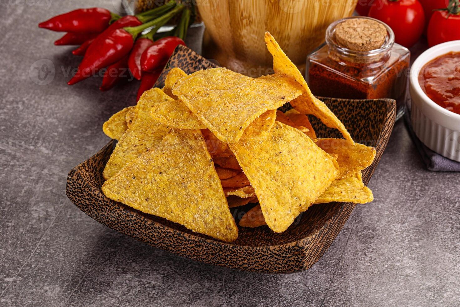 Mexican corn nachos chips with salsa photo