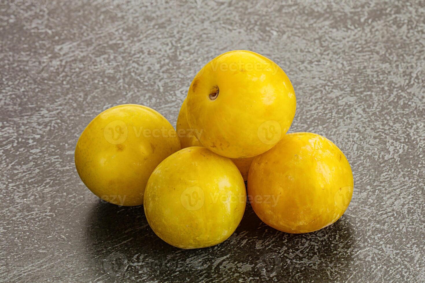 Yellow sweet plum heap fruit photo