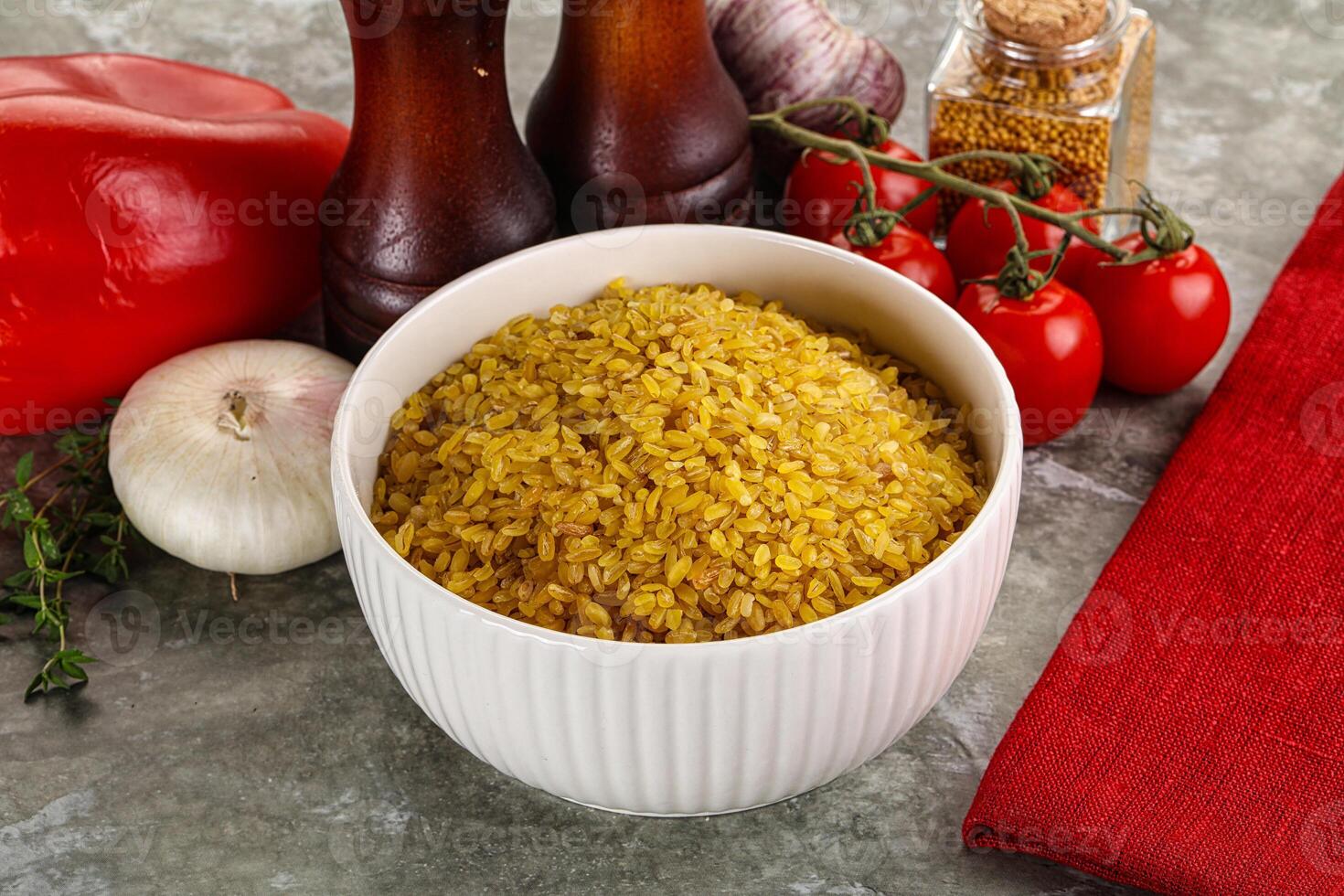Dry wheat bulgur cereal heap photo