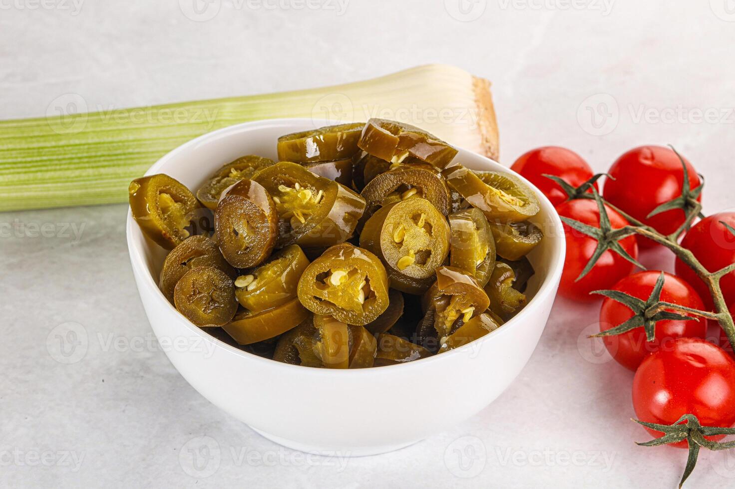 Sliced canned jalapeno pepper photo