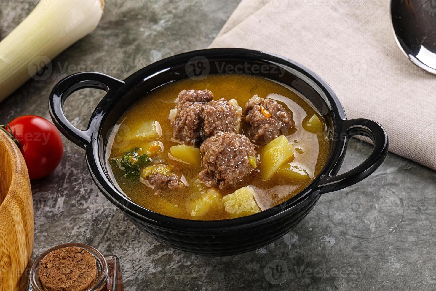 Soup with beef meatball and vegetables photo