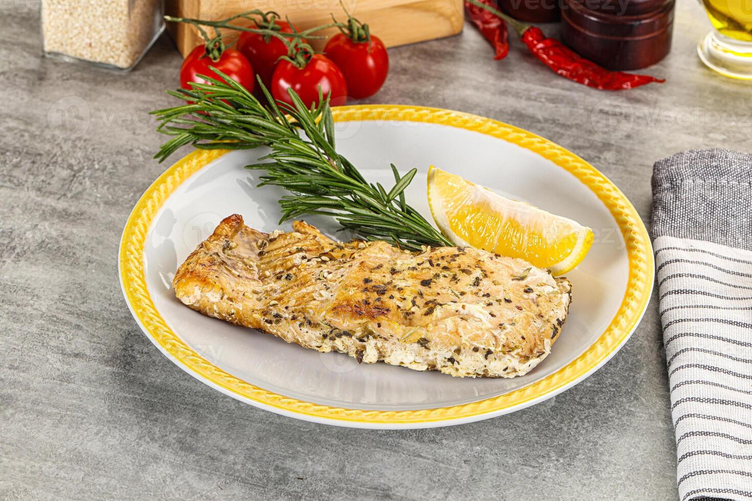 Baked salmon fish served rosemary photo