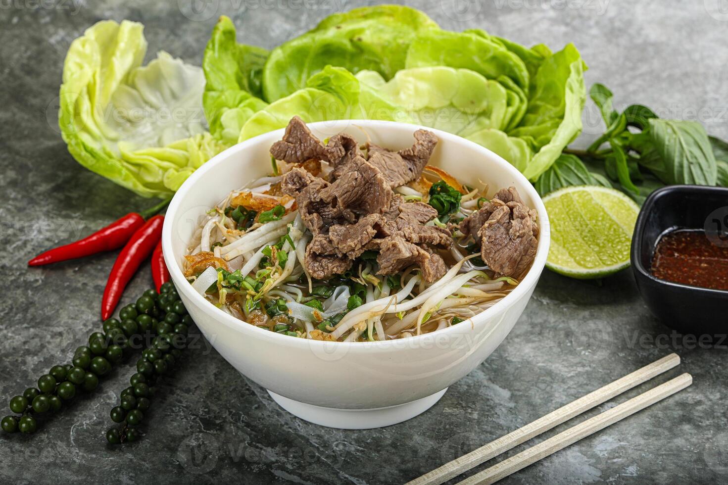 Vietnamese traditional soup Pho Bo with beef photo