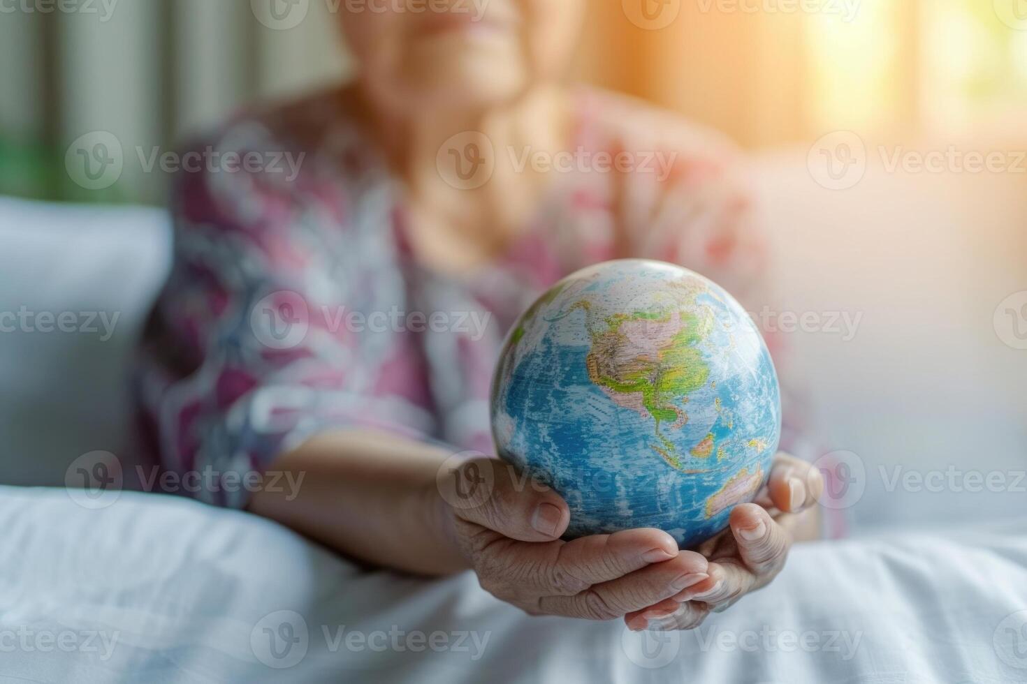 AI generated Elderly Asian patient with globe symbolizes health in hospital. photo