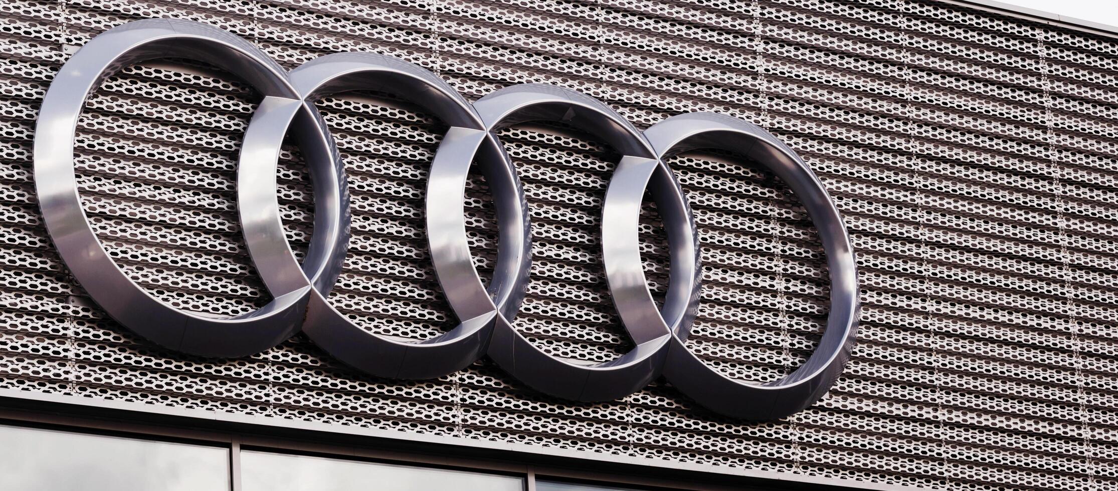 Minsk, Belarus, January 19, 2024 - Audi emblem on a building. photo