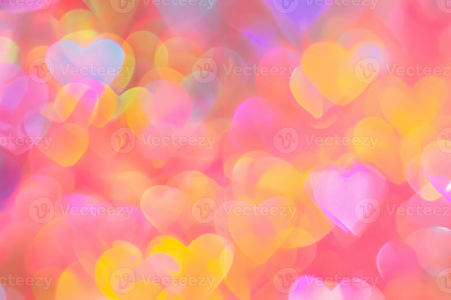 blurred heart shaped holographic bokeh lights background photo
