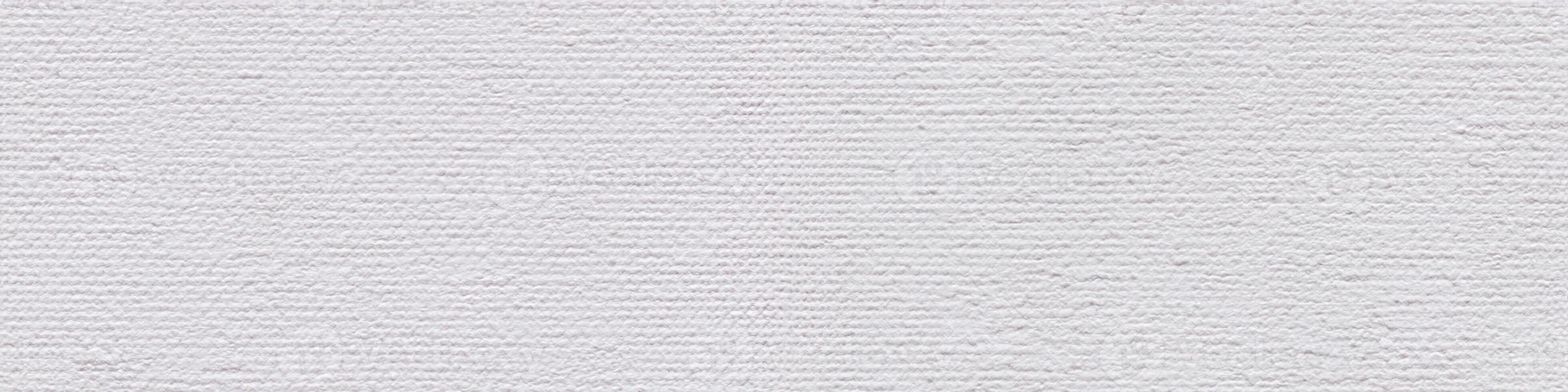 Classic white acrylic canvas background as part of your creative work. Seamless panoramic texture. photo