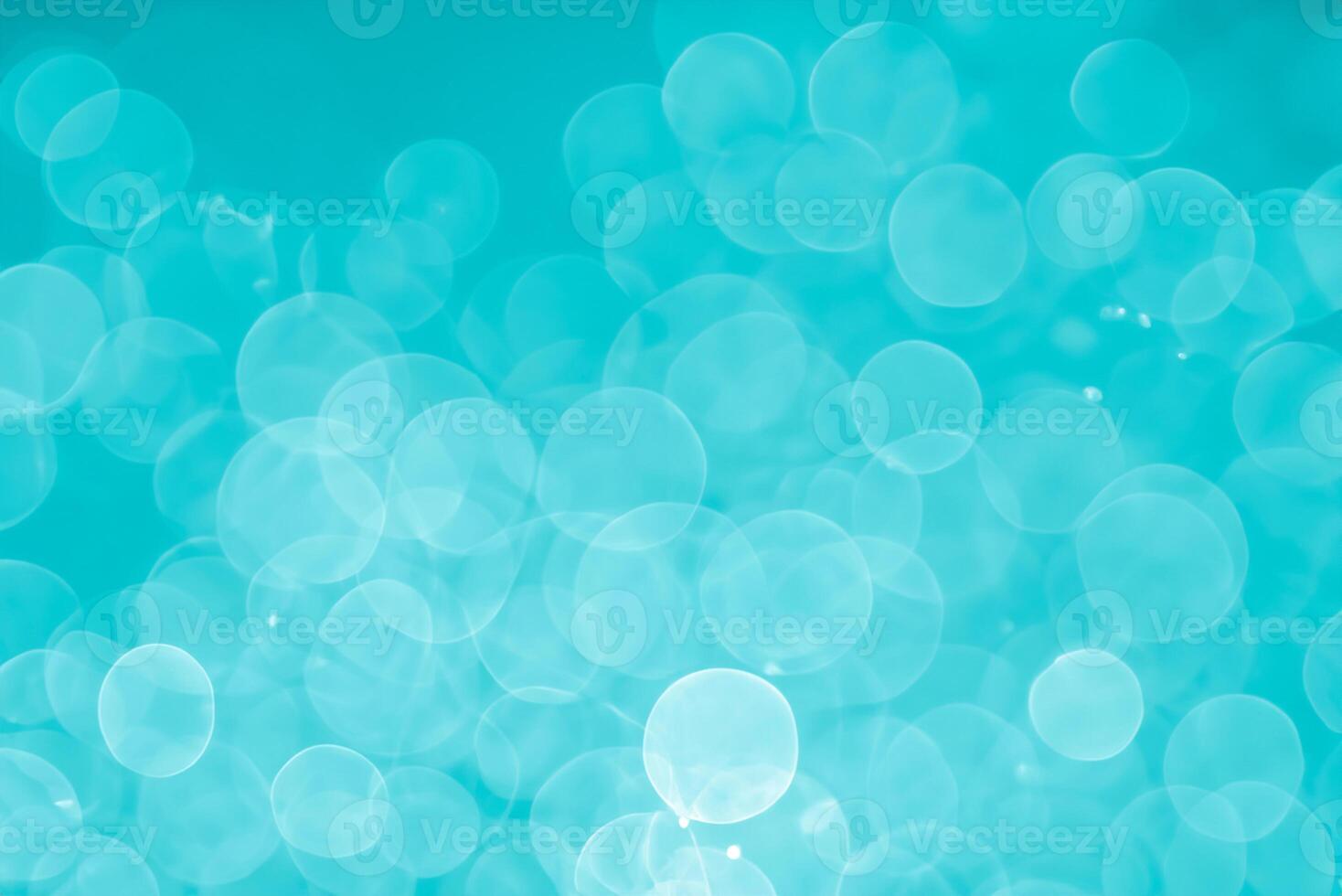 abstract aqua blue background with soft blur bokeh light effect photo