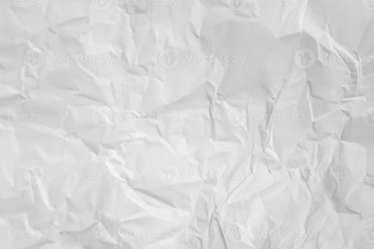 Crumpled white paper background photo