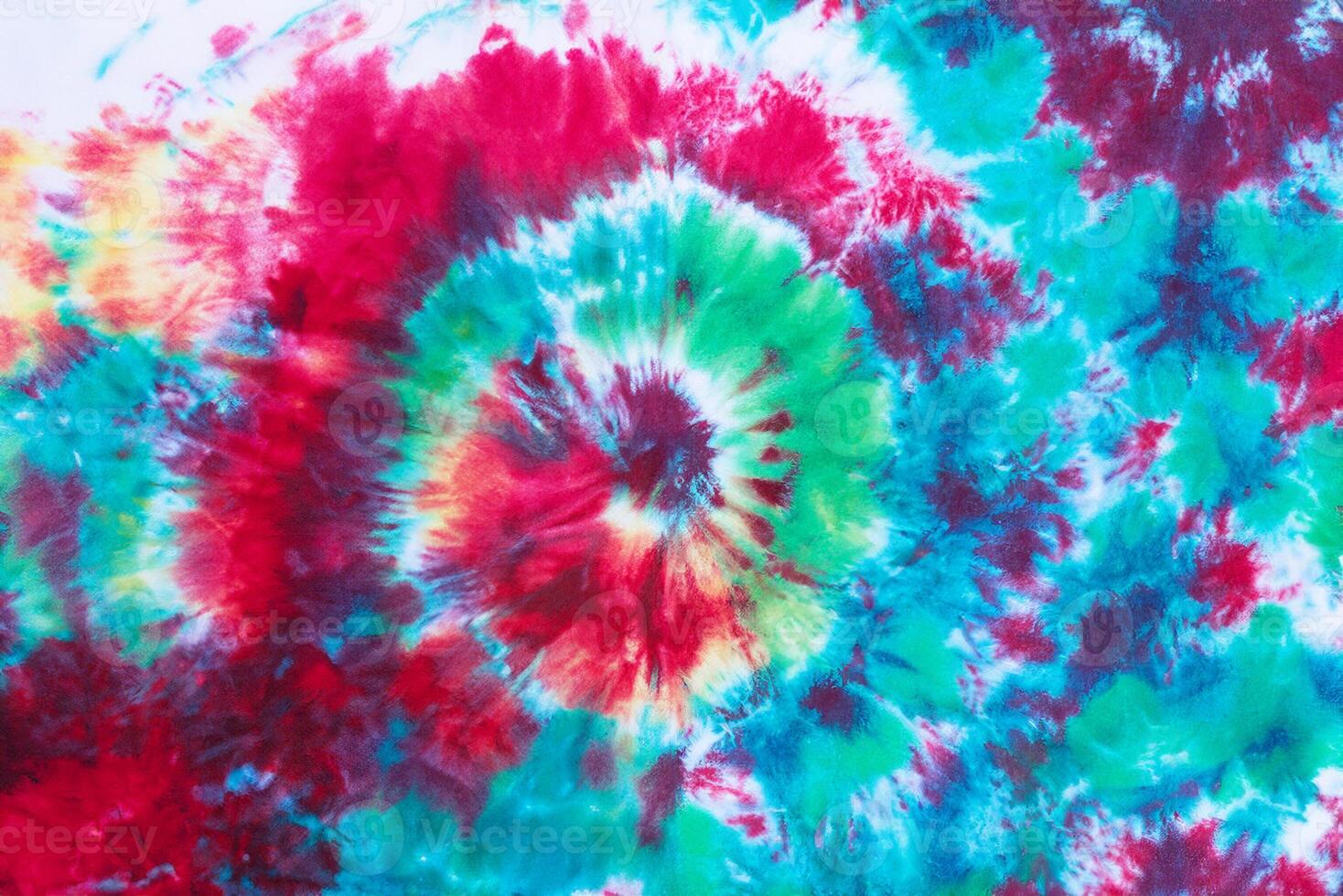 tie dye pattern hand dyed on cotton fabric abstract texture background. photo