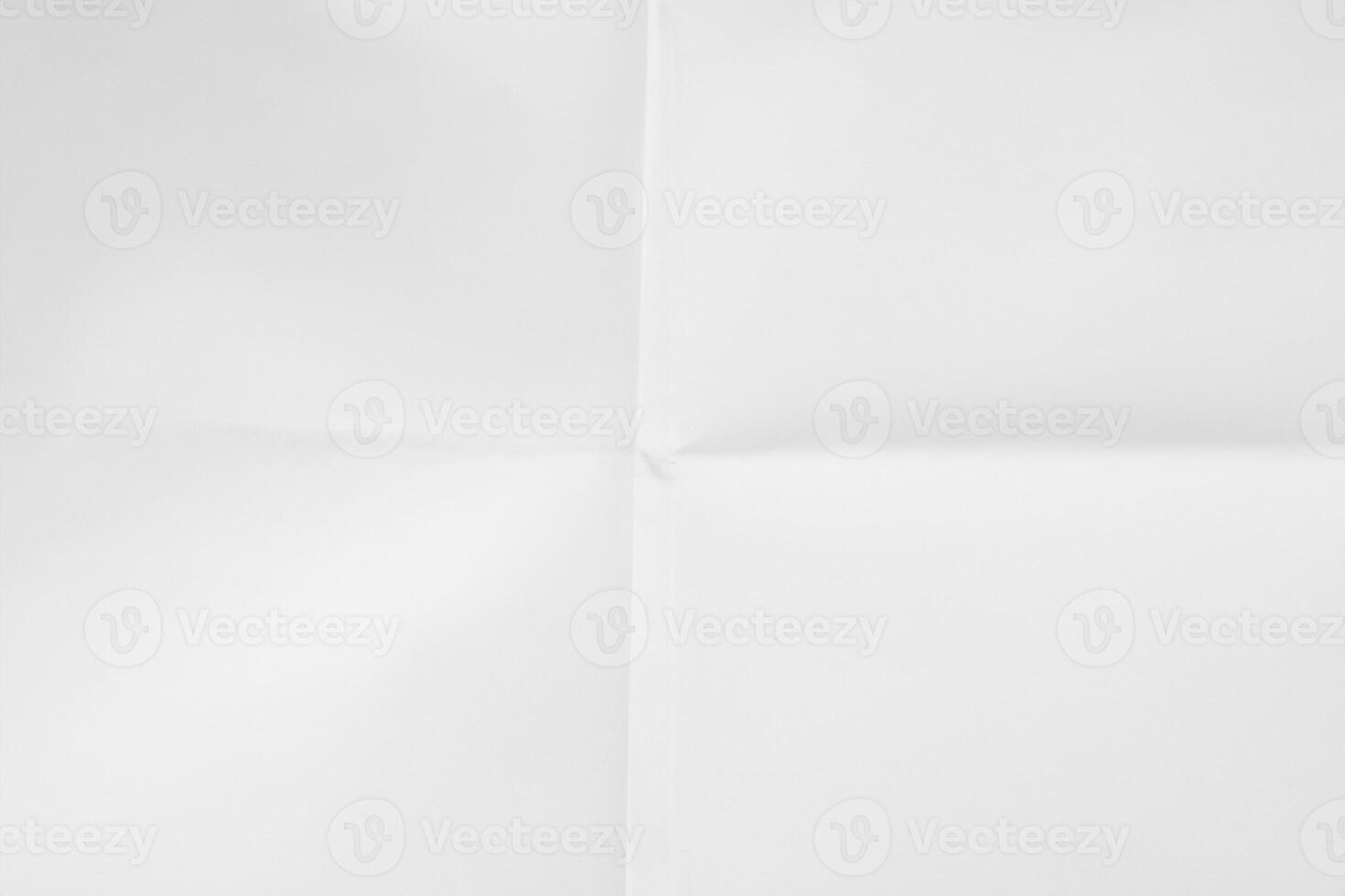 White sheet of paper folded texture photo