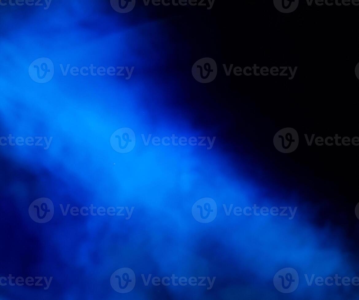 blue smoke on a black background photo