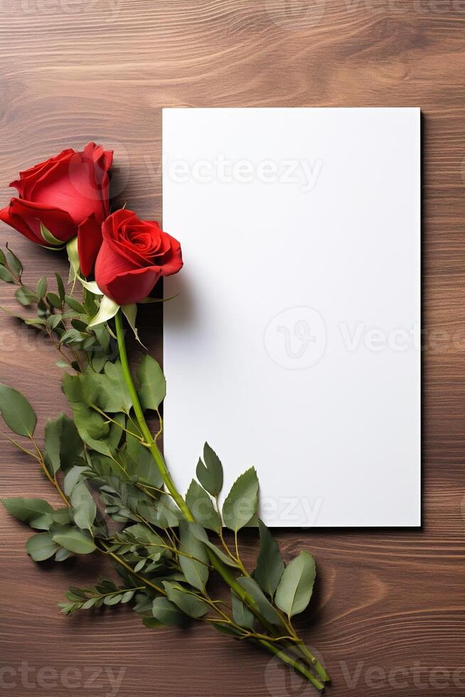 AI generated vertical mockup white blank paper sheet with red roses top view on wooden background photo