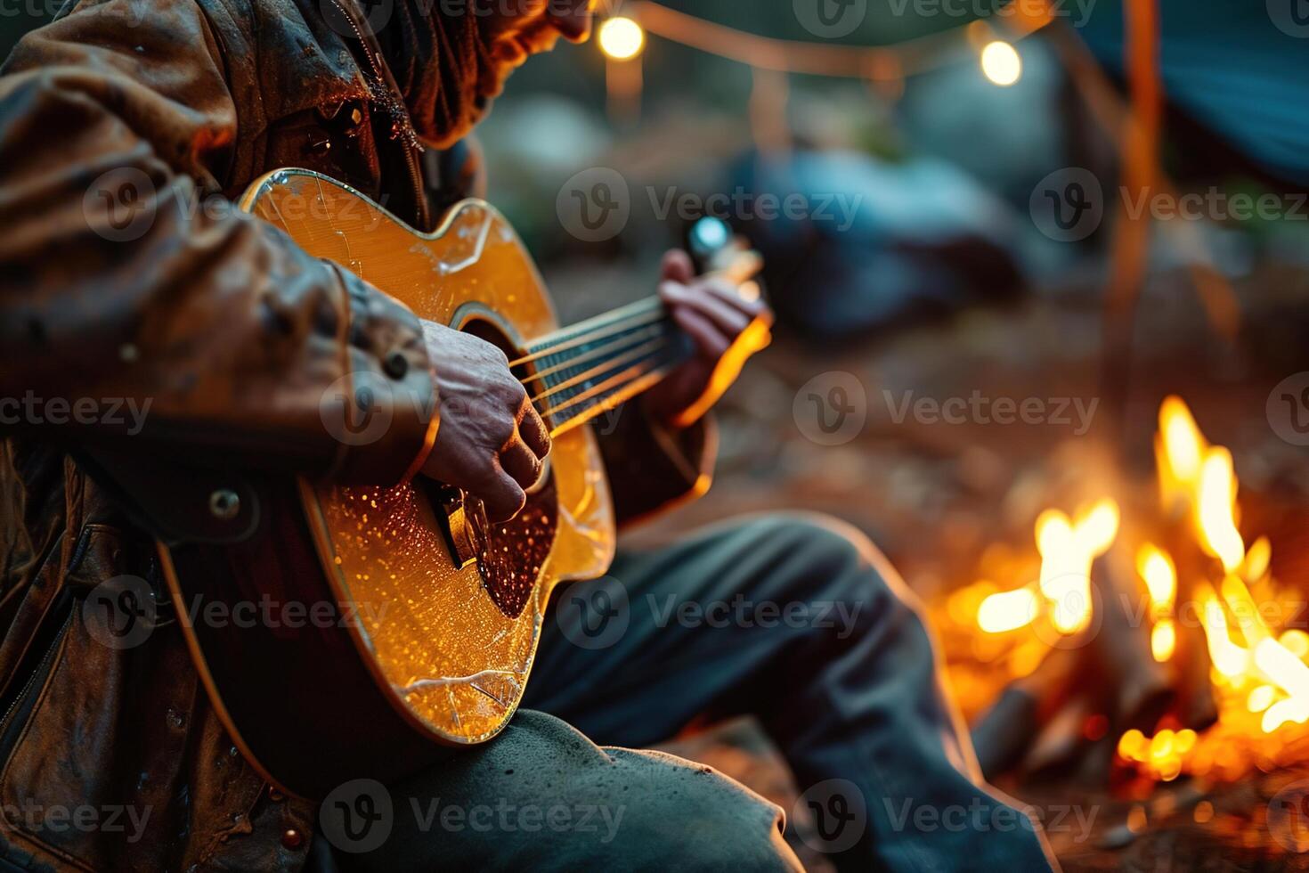 AI generated wanderer in a brown leather jacket plays an old cracked guitar in a camp near a burning fire in the autumn forest photo