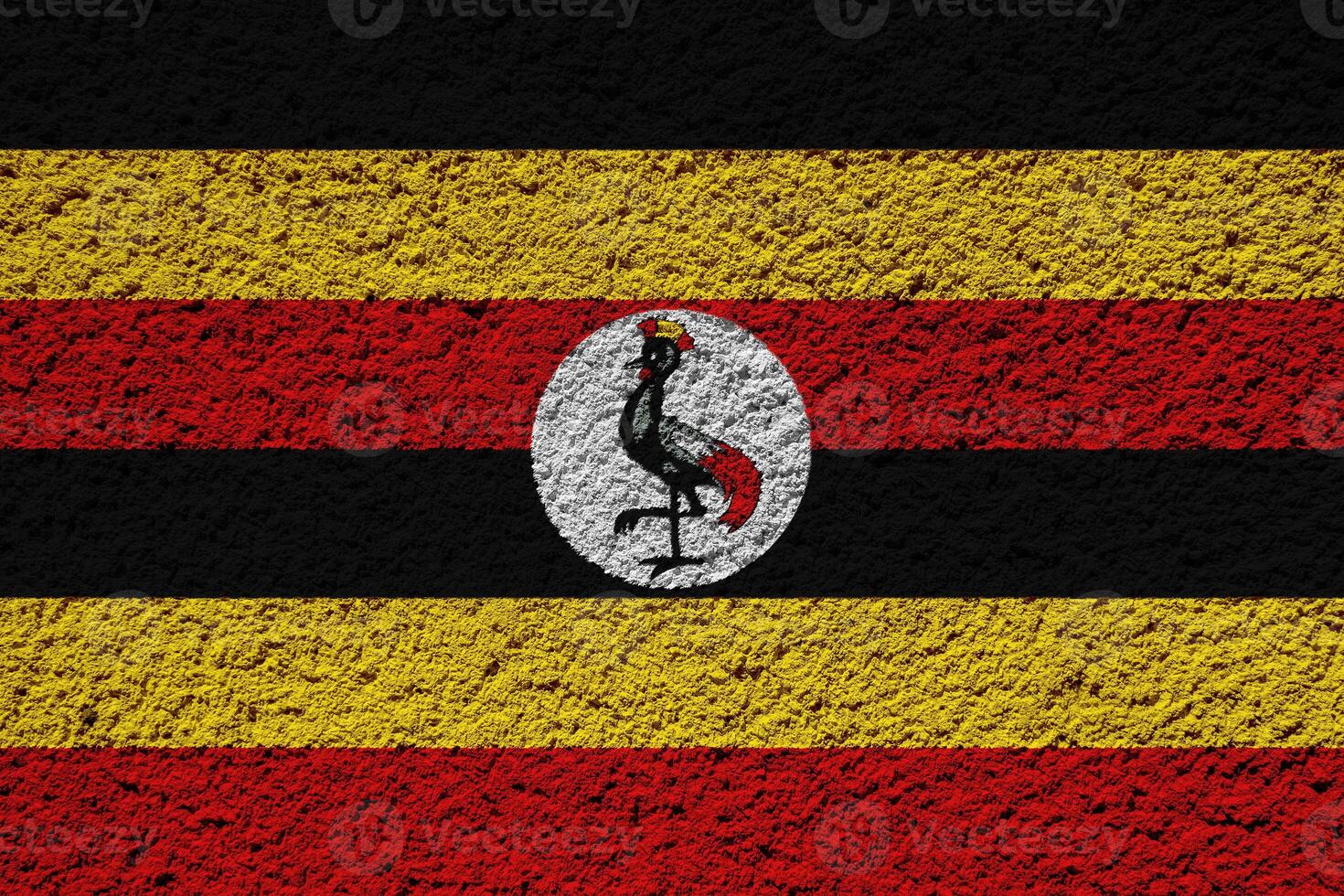 Flag of Republic of Uganda on a textured background. Concept collage. photo