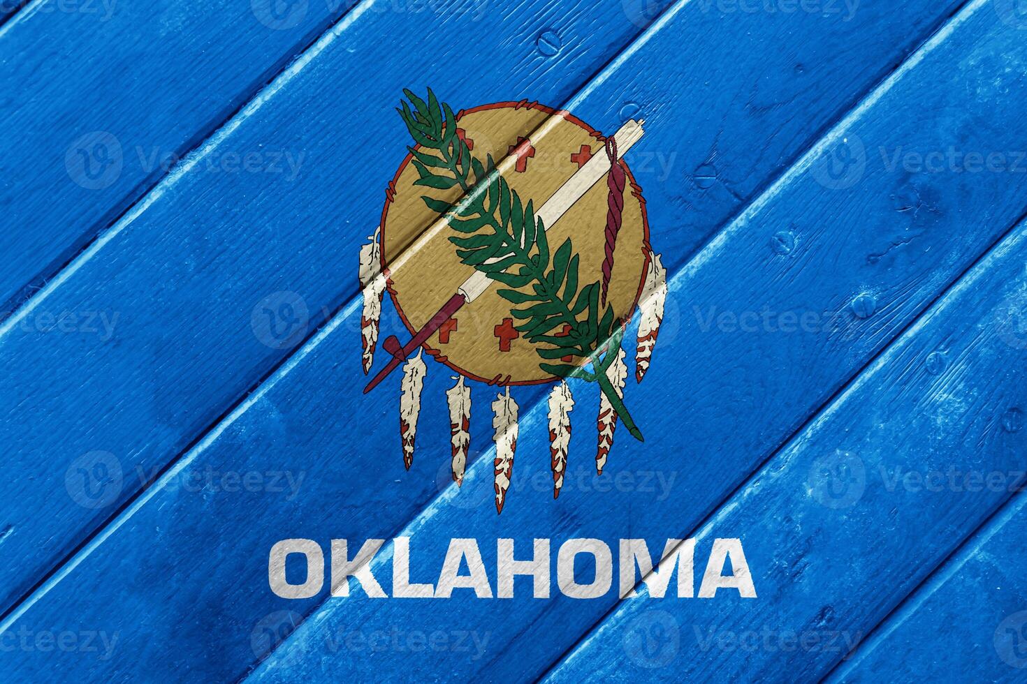 Flag of Oklahoma state USA on a textured background. Concept collage. photo