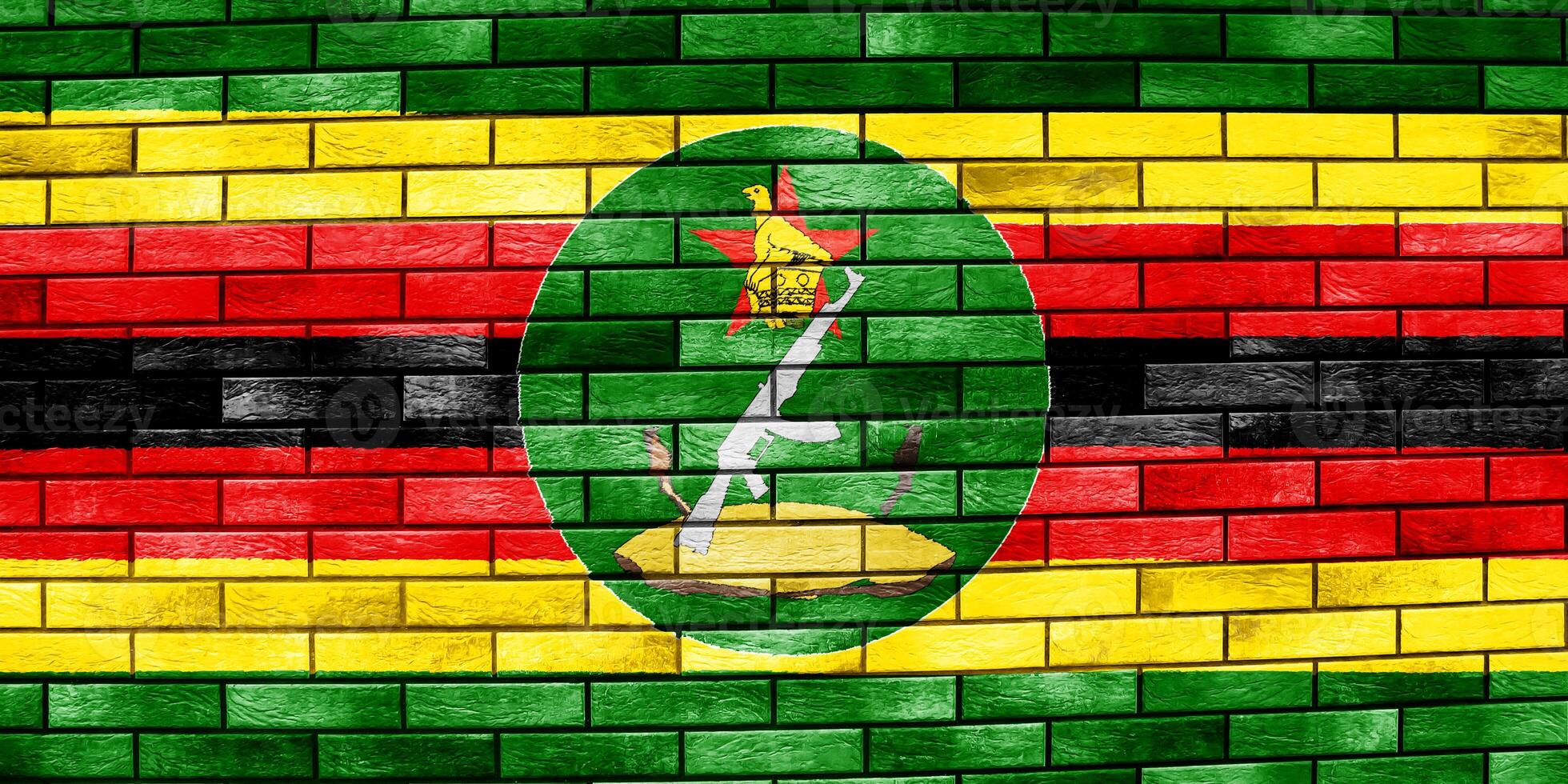 Flag and coat of arms of Republic of Zimbabwe on a textured background. Concept collage. photo