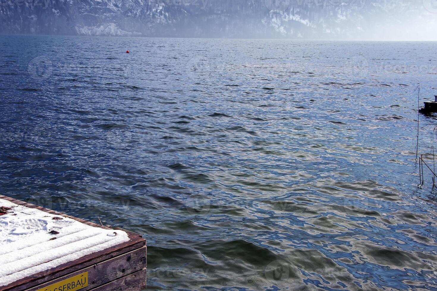 Landscape on Lake Traunsee in Salzkammergut in Upper Austria in winter. photo