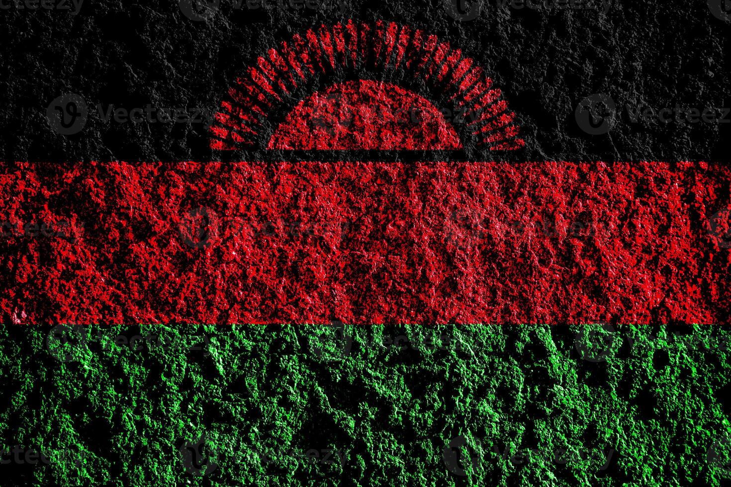 bandera de república de malawi en un texturizado antecedentes. concepto collage. foto