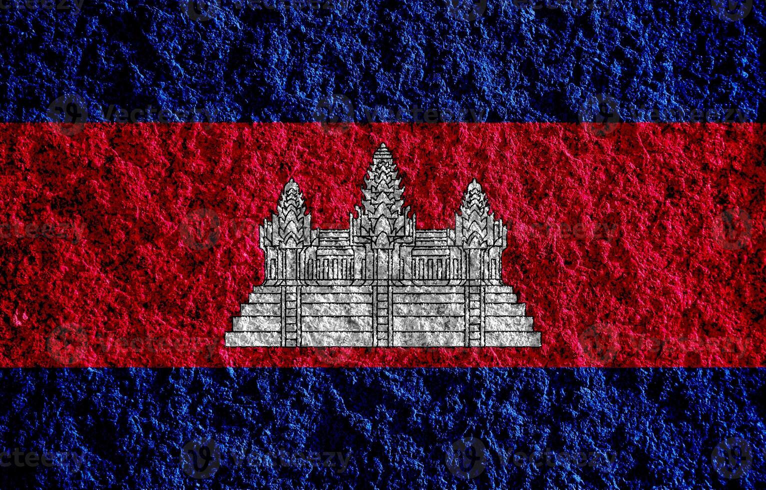 bandera de Reino de Camboya en un texturizado antecedentes. concepto collage. foto