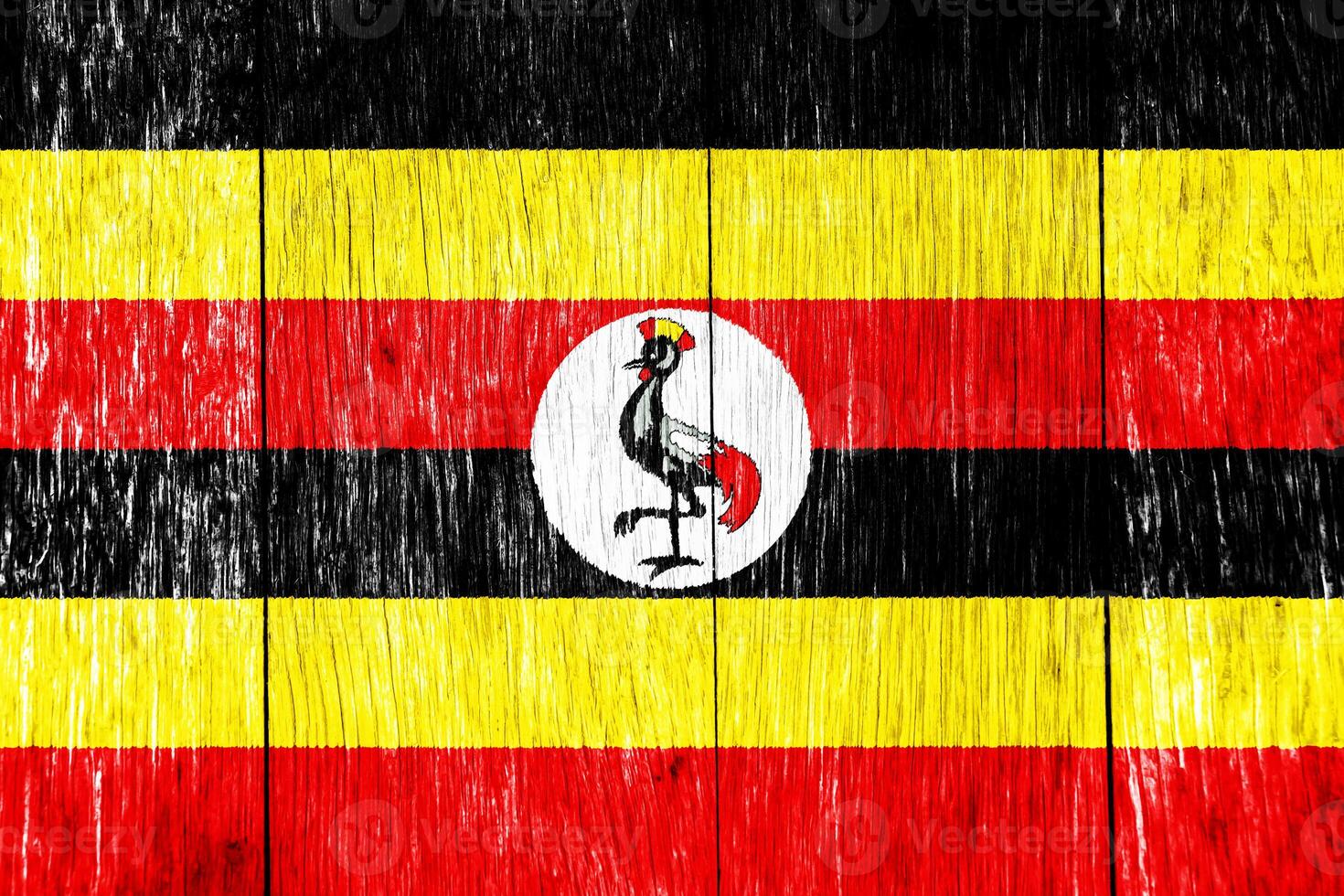 Flag of Republic of Uganda on a textured background. Concept collage. photo