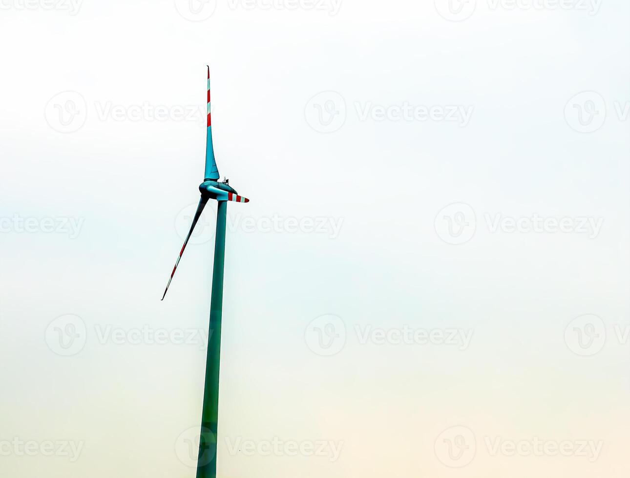 Wind turbine station windmill park next to the road in Austria in cloudy weather. photo