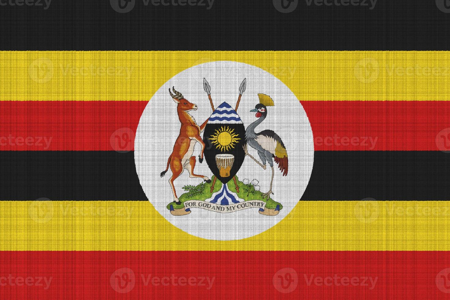 Flag and coat of arms of Republic of Uganda on a textured background. Concept collage. photo