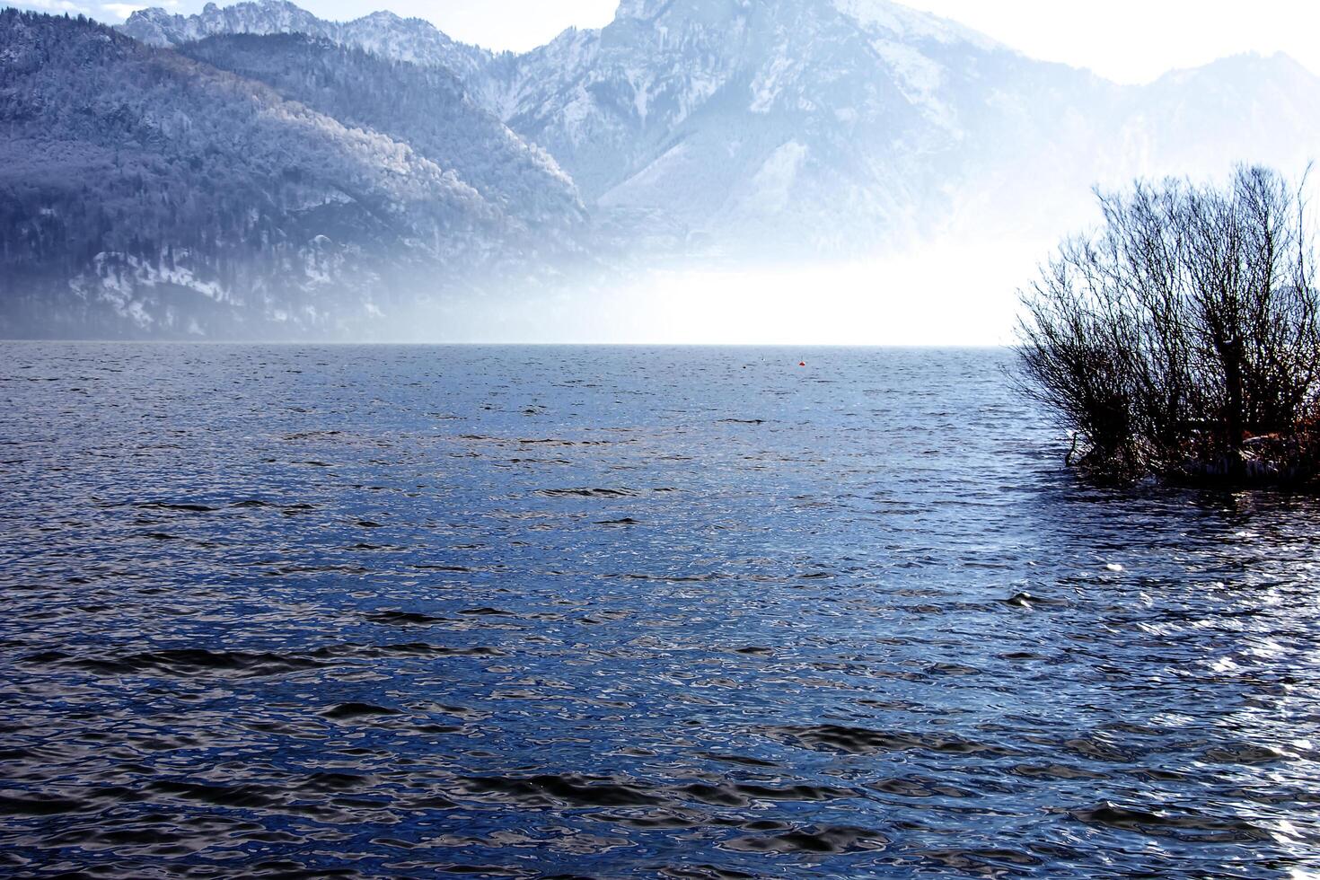Landscape on Lake Traunsee in Salzkammergut in Upper Austria in winter. photo