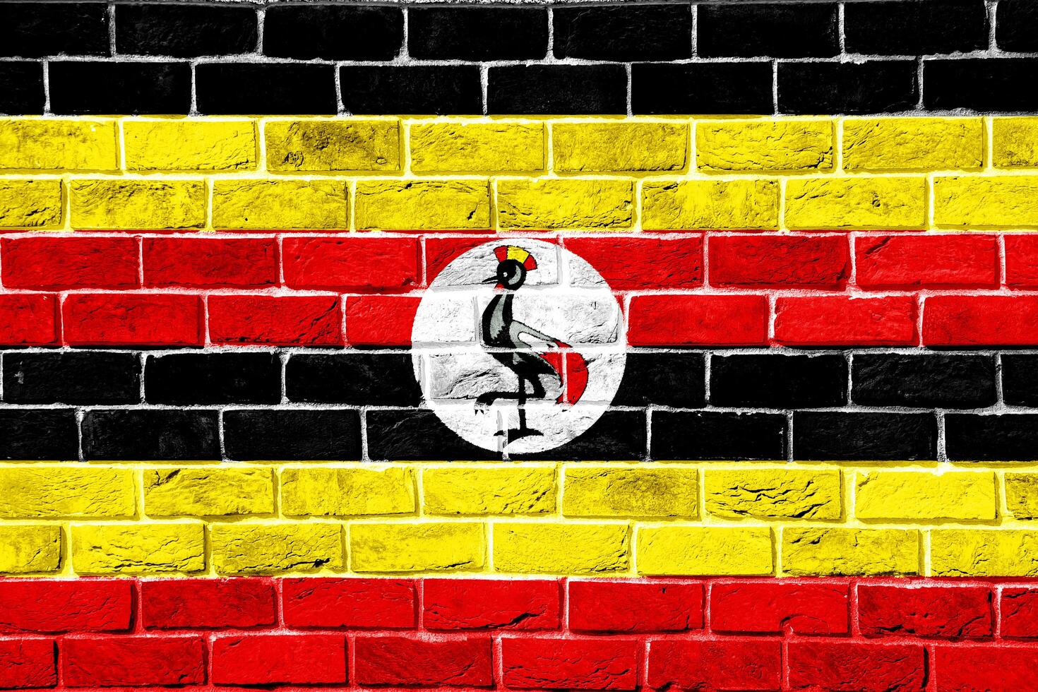 Flag of Republic of Uganda on a textured background. Concept collage. photo