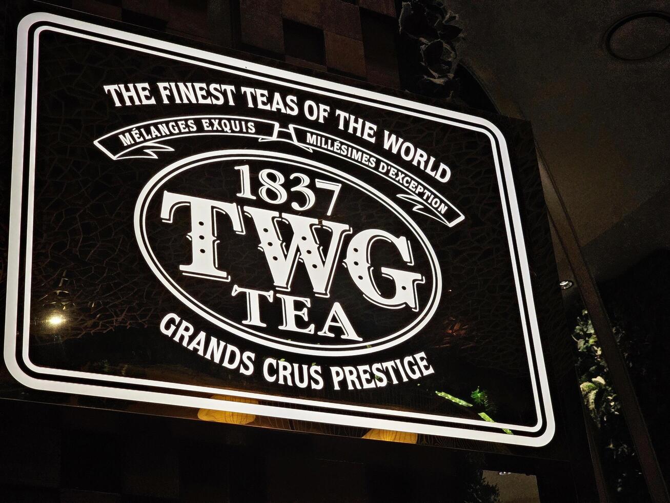 BANGKOK, THAILAND DECEMBER 28, 2023 TWG Tea Sign. a Singaporean luxury teahouse chain and a namesake brand of artisanal tea, was founded in 2008. photo