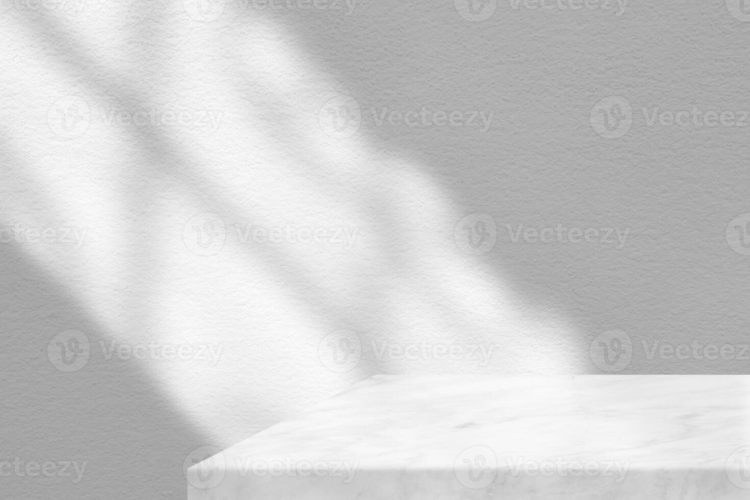 Minimal White Marble Table Corner with Light Beam from Window to Concrete Wall Background, Suitable for Product Presentation Backdrop, Display, and Mock up. photo