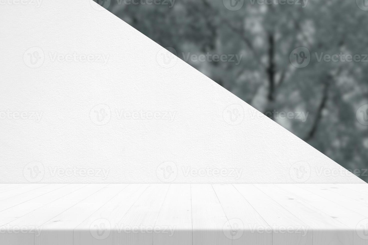White Wooden Table with Concrete Wall and Blurred Garden Background, Suitable for Product Presentation Backdrop, Display, and Mock up. photo