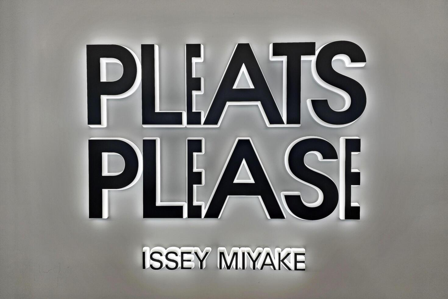 FUKUOKA, JAPAN  NOVEMBER 19, 2023 Pleats Please ISSEY MIYAKE sign. It is a famous Japanese fashion store. photo