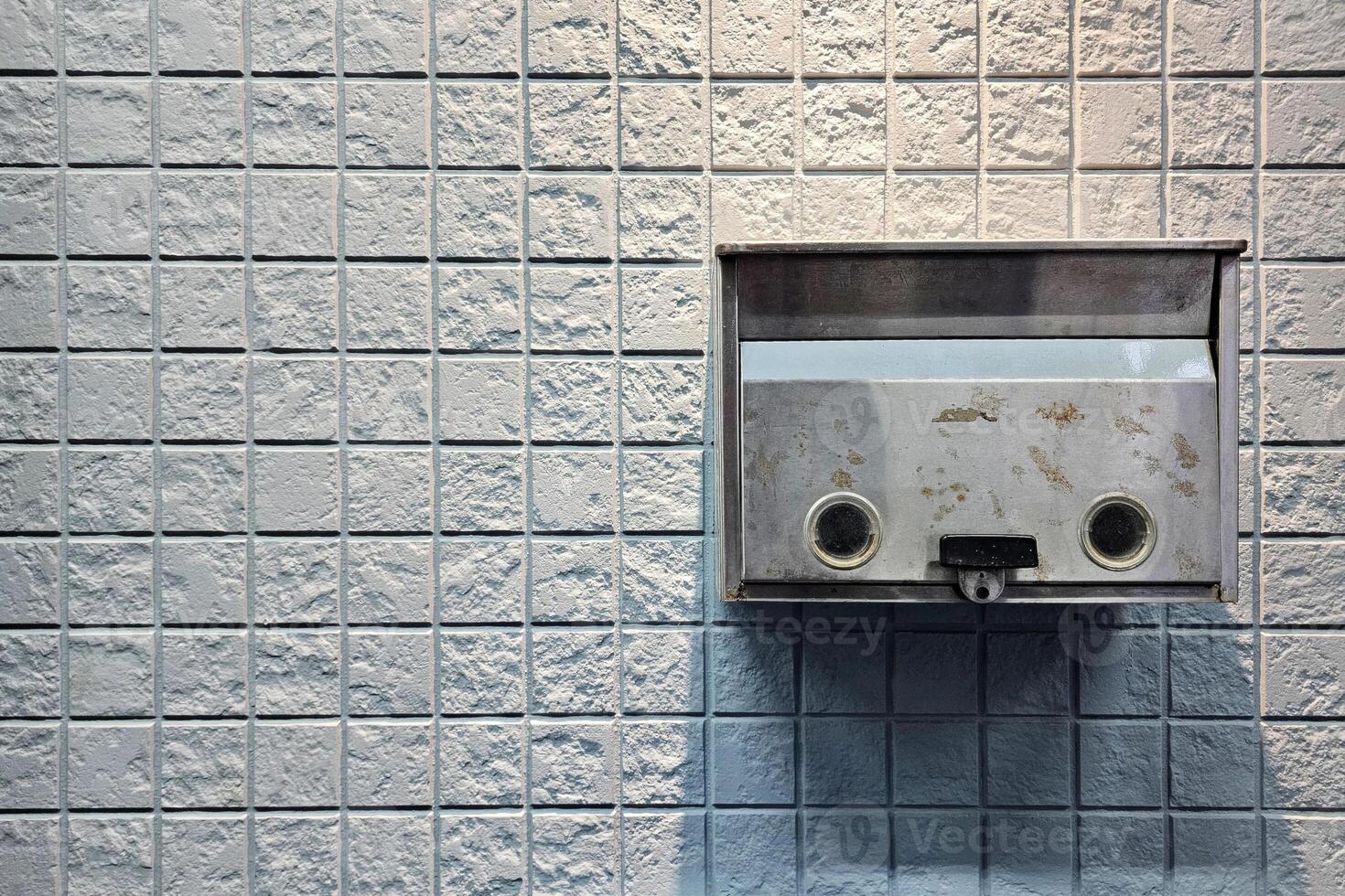 Vintage Metal Mail Box on Wall. photo