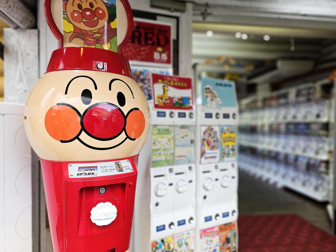 YUFUIN, JAPAN  NOVEMBER 12, 2023 Anpanman vending machine at Yufuin. Anpanman is a Japanese children superhero anime that created by Takashi Yanase. photo