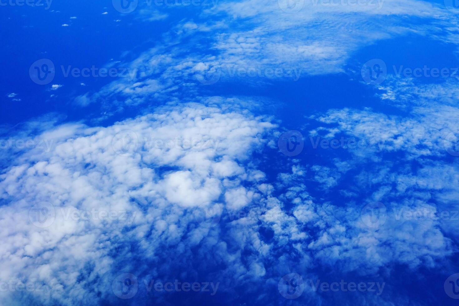 Top View of Clouds from Airplane Window. photo