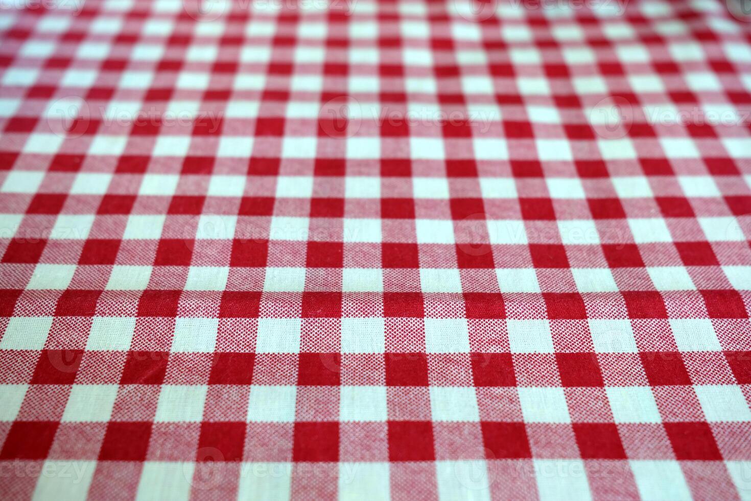Red Checkered Tablecloth Texture Background. photo