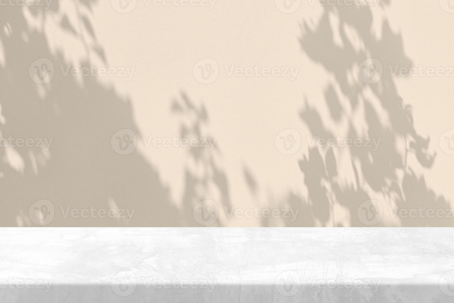 White Stone Table with Tree Shadow in the Garden on Concrete Wall Texture Background in Set Sail Champagne Color Tone, Suitable for Product Presentation Backdrop, Display, and Mock up. photo