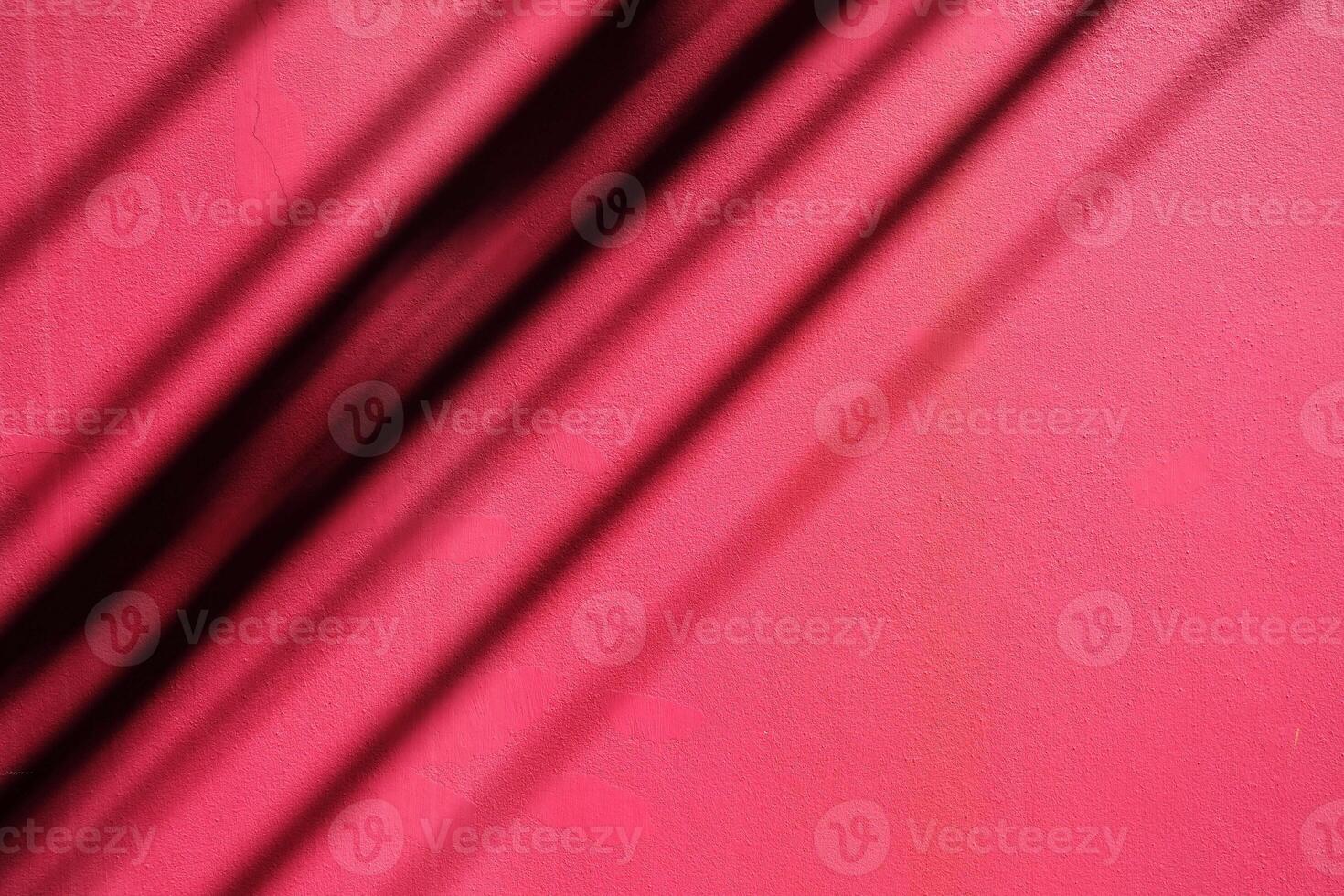 Shadow of Electric Wires on Pink Concrete Wall Texture Background. photo