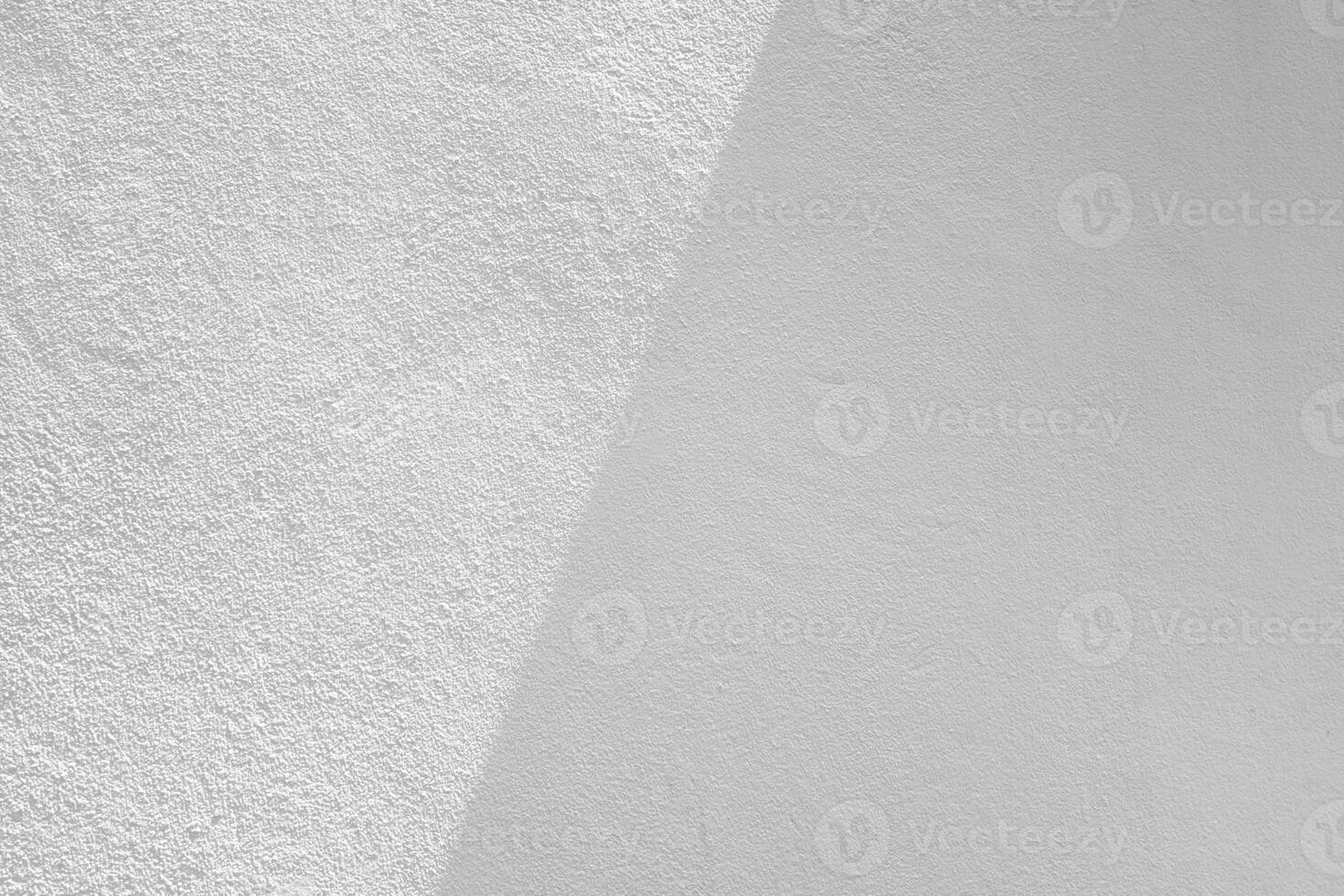 White Stucco Wall with Shadow and Light Beam on Surface, Suitable for Making Blur to multiply and overlay on Product Presentation. photo