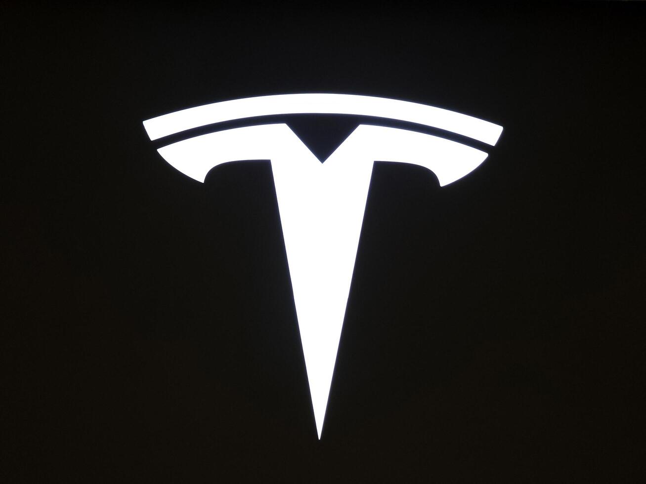 BANGKOK, THAILAND JULY 19, 2023 Tesla logo sign. Tesla, Inc. is an American multinational automotive and clean energy company that was founded in July 1, 2003. photo