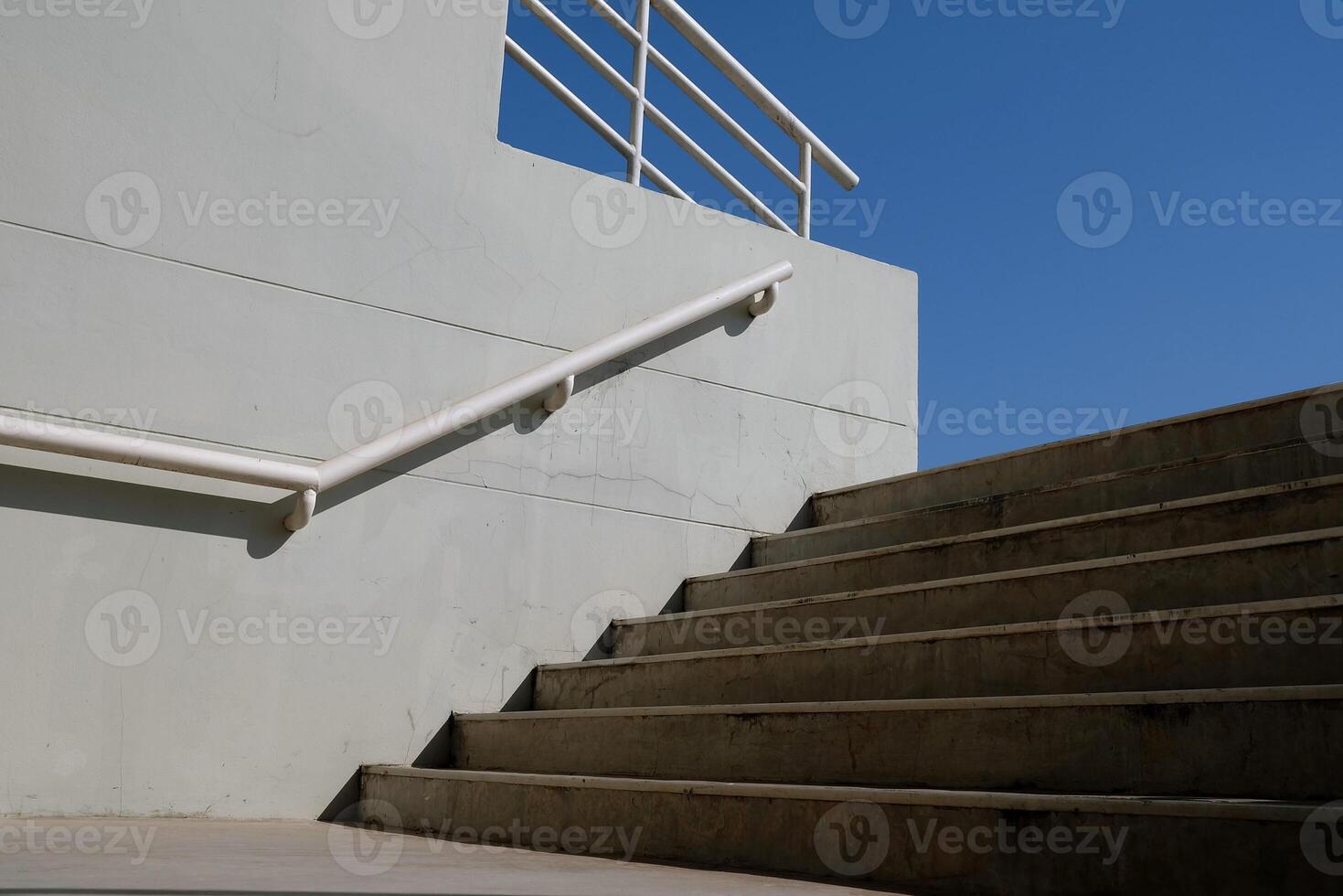 Concrete Stair in the Sport Stadium with Blue Sky. photo