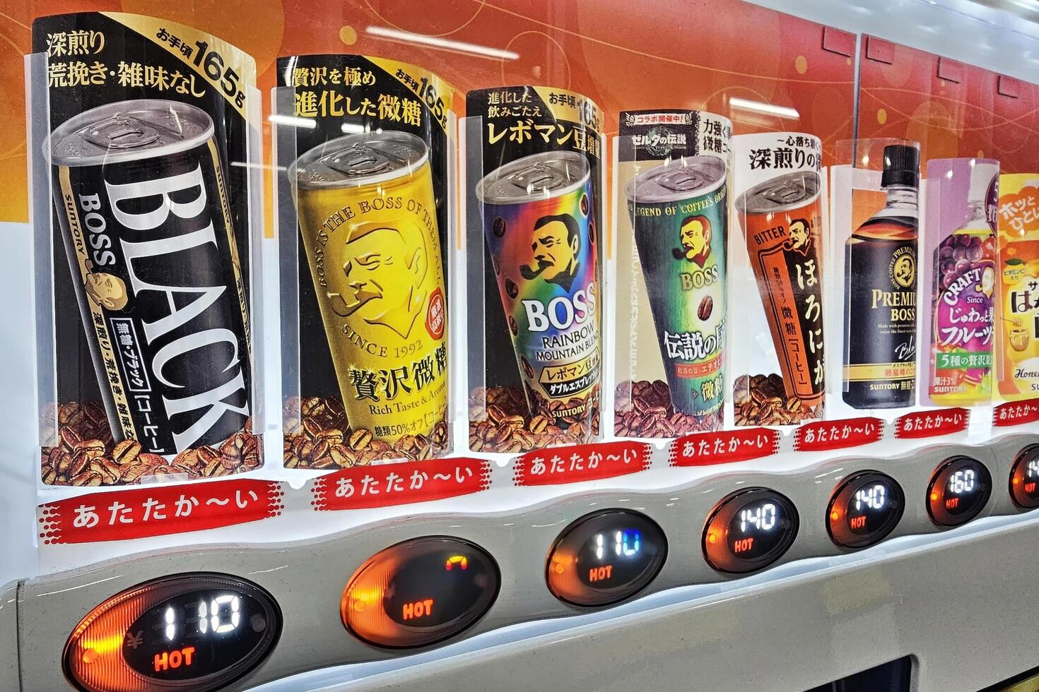FUKUOKA, JAPAN NOVEMBER 14, 2023 Boss coffee of vending machine. Boss coffee is a famous coffee can in Japan and released in 1992. photo