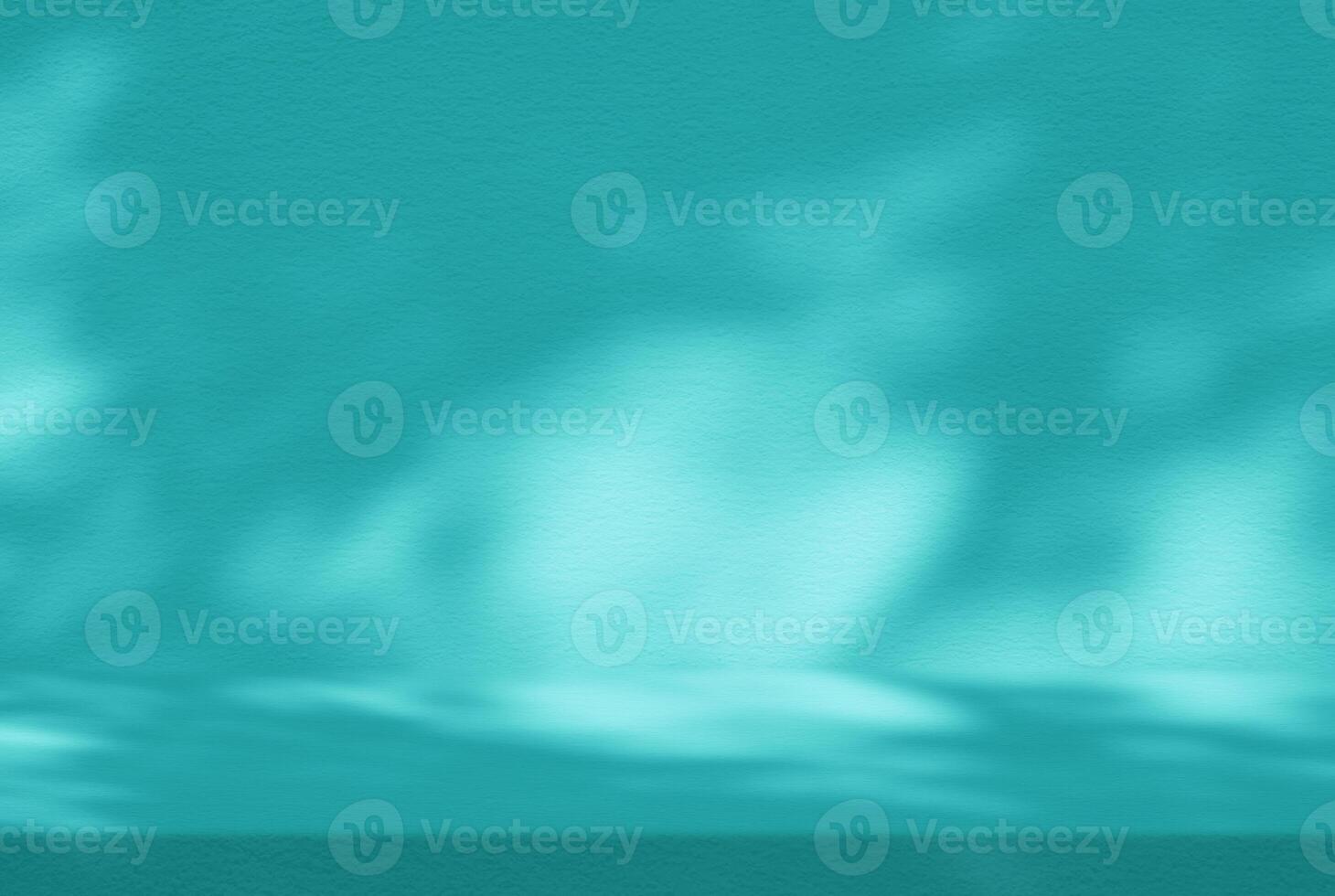 Cyan Stucco Table with Nature Shadow on Concrete Wall Texture Background, Suitable for Cosmetic Product Presentation Backdrop, Display, and Mock up. photo