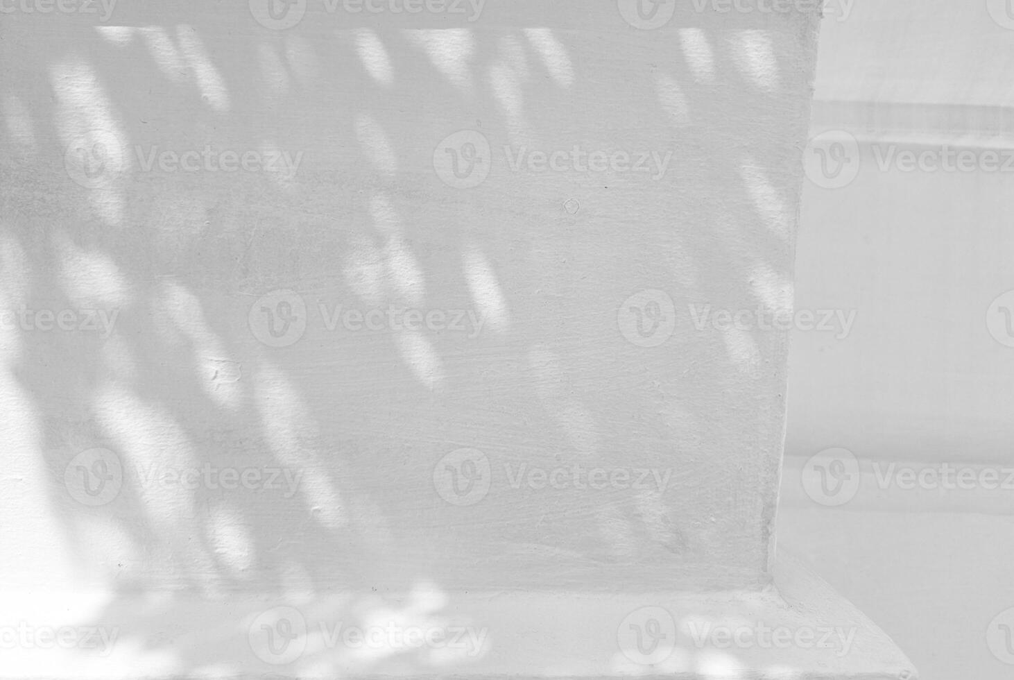 White Stucco Wall with Natural Bokeh Light and Shadow Background. photo