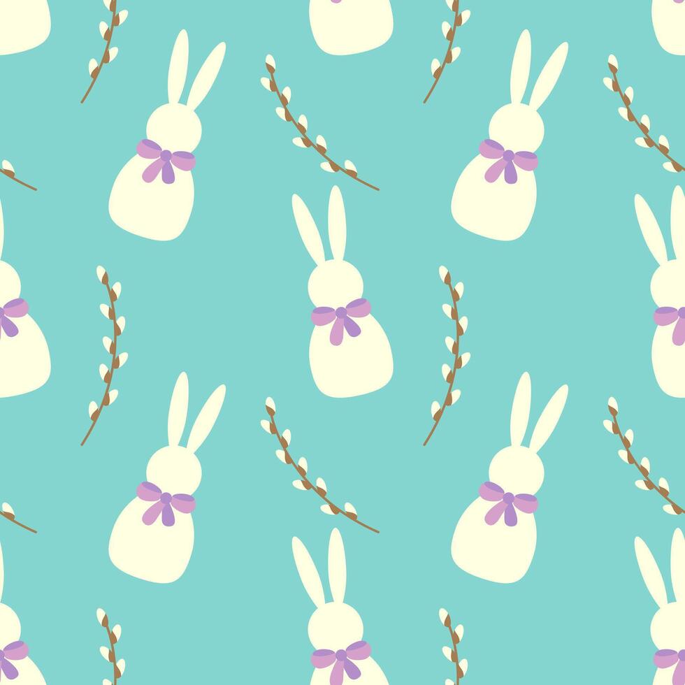 Seamless pattern of white Easter bunnies and willow branches on blue background. vector