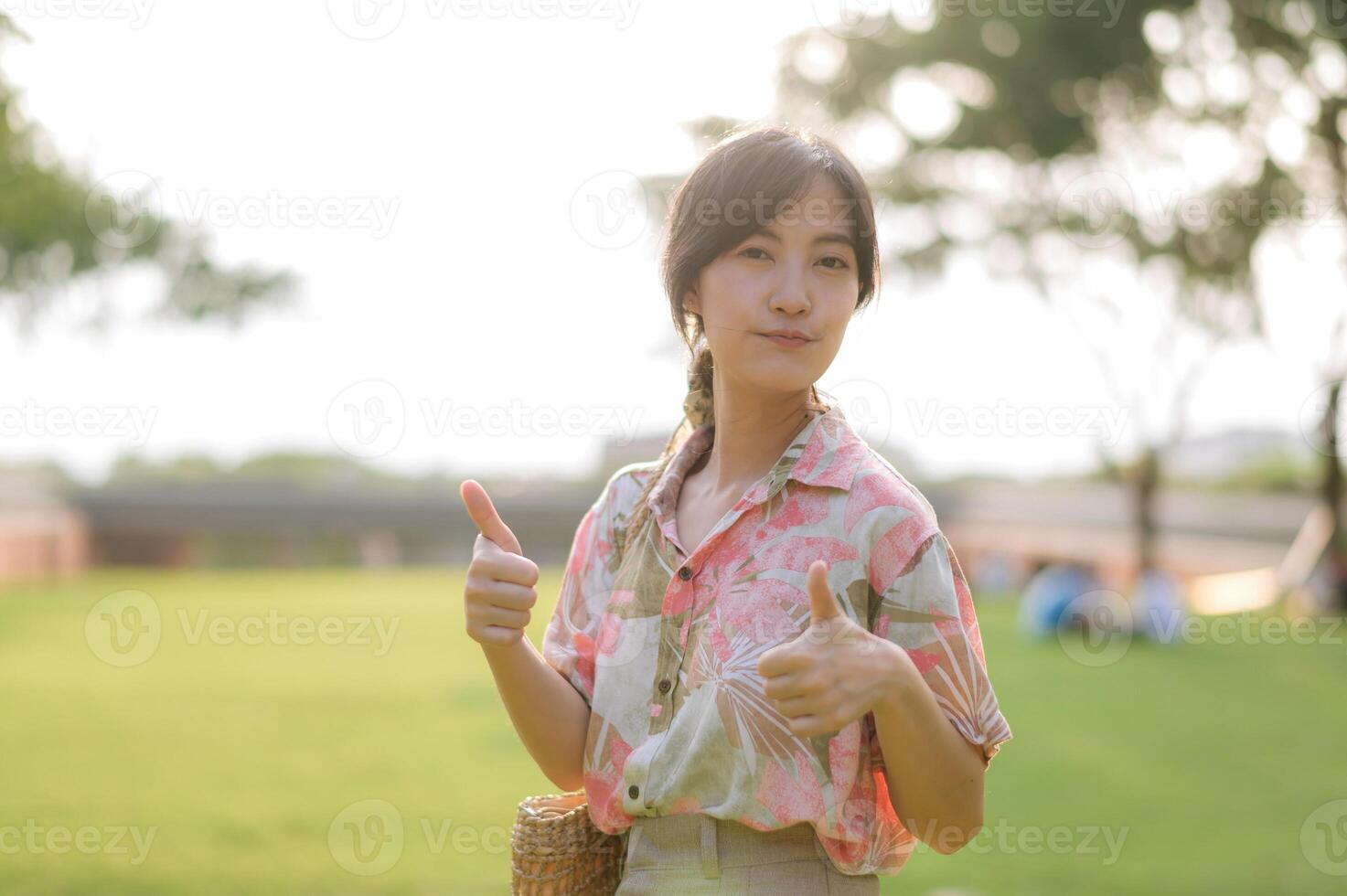 Portrait beautiful young asian woman on summer holiday vacation trip in Thailand. Young hipster female tourist sightseeing summer urban Bangkok destination. Asia summer tourism concept. photo
