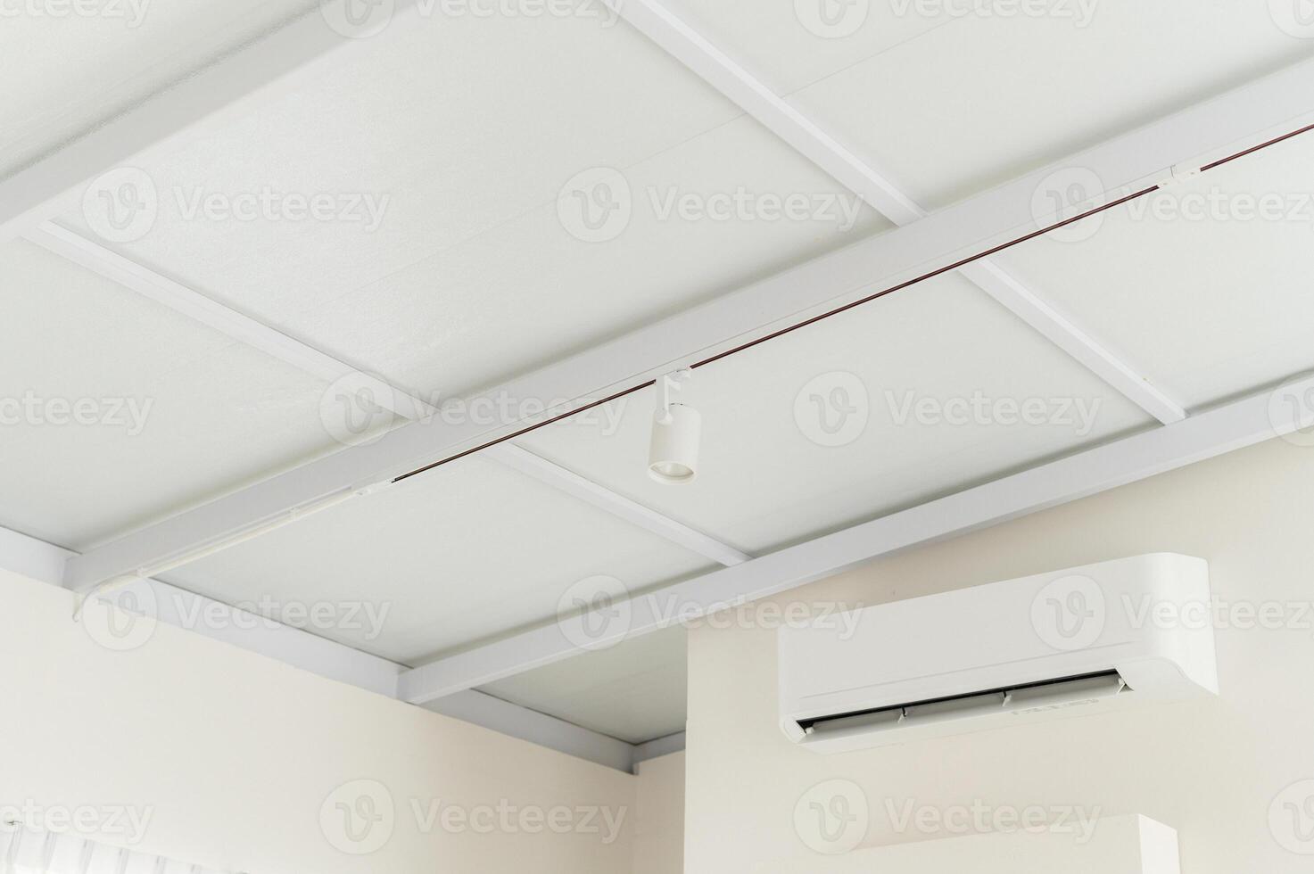 air conditioning system. pure indoor climate. With advanced technology and energy efficient operation, white room wall mounted unit ensures optimal temperature and ventilation. photo